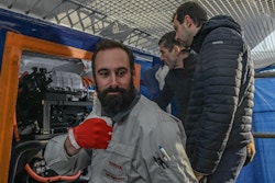 A person waves with his hand that the integration of the fuel cell has been successful