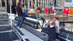 Energy Observer's hydrogen tanks being removed from their casings