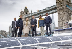 Pictures of Victorien Erussard, Jérôme Delafosse, and leaders from IMO and IRENA on the upper deck of Energy Observer in London, UK