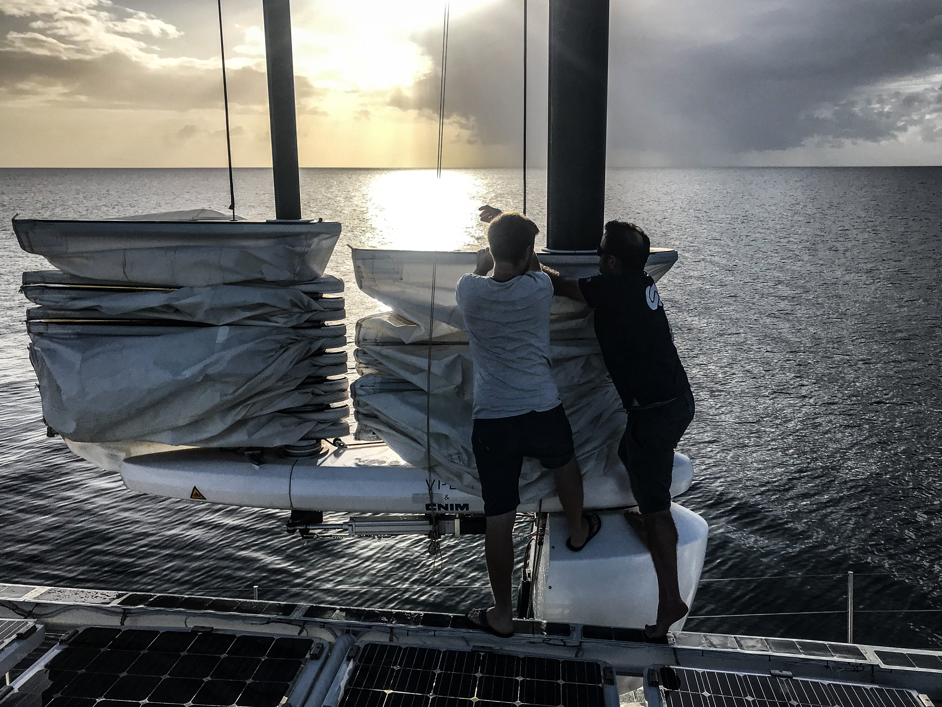 Two crew members are doing maintenance on the OceanWings®