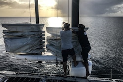 Two crew members are doing maintenance on the OceanWings®