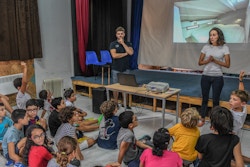 Marin and Amélie present Energy Observer to students at Adrien Brechet School