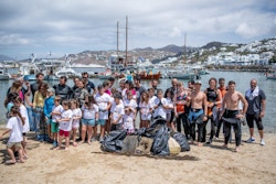 A group of people during a beach cleaning leaning operation